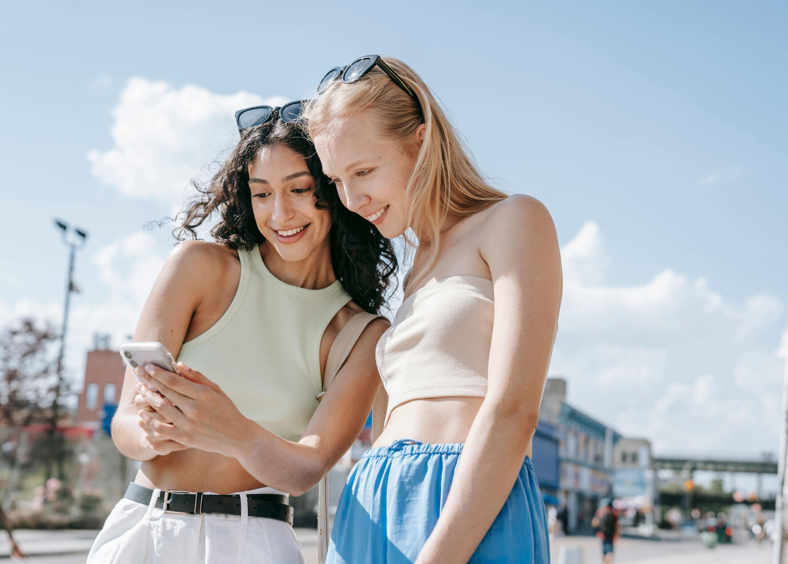 pretty women looking at a dating app on phone