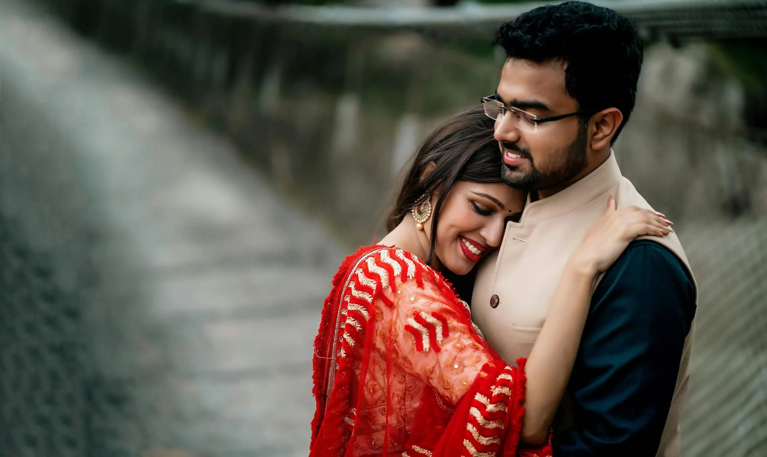 Indian couple hugging, met by using dating app